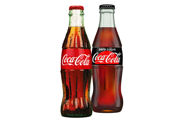 Two glas bootles of coca cola, coca cola classic and coca cola zero 300ml